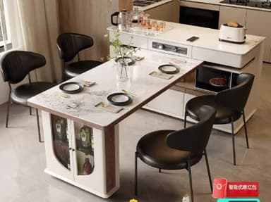 A modern kitchen island with a marble-patterned countertop that extends to form a dining table. The island incorporates storage cabinets, a built-in microwave, and features a smooth, sleek design. The extending table section has two place settings, suggesting it's designed for dining or serving. One section of the island features glass-fronted cabinets displaying bottles. — 3D model