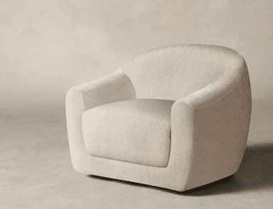 A contemporary, fully upholstered lounge chair in a light, textured boucle fabric, featuring a rounded, sculptural form and a low-profile design. — 3D model