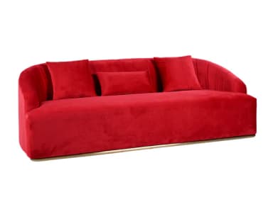 A modern red velvet sofa with a curved back and armrests. The back features vertical channeling, and it comes with three throw pillows: two square and one rectangular. The sofa is elevated by a thin, polished metallic base. — 3D model