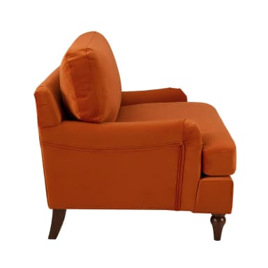 A plush, deep-seated armchair upholstered in a vibrant rust orange velvet fabric. It features rolled arms, a T-cushion backrest, and a single seat cushion. The chair is supported by four dark, turned wooden legs. — 3D model