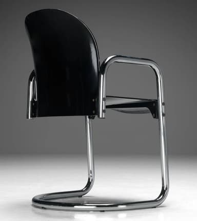 A cantilever armchair with a curved black seat and back, supported by a chrome-plated tubular steel frame. The frame forms a continuous loop for the base and extends upwards to create armrests and supports for the seat and back. The seat and back appear to be made of molded plastic or a similar material. — 3D model