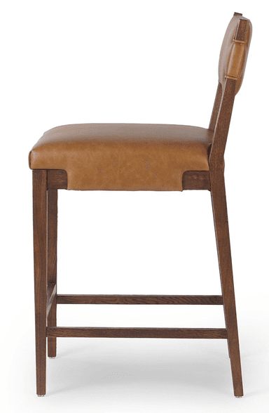 A bar stool featuring a sturdy dark oak wood frame and a brown leather upholstered seat and backrest. The backrest and seat are integrated into the frame with distinctive wrap-around detailing of the leather around the wood. It has two horizontal footrests and visible wood grain. — 3D model