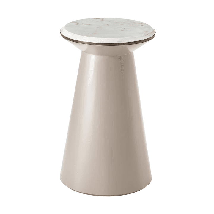 A small, round-top pedestal table with a white marble top and a conical, lacquered base. The marble top features grey veining and is encircled by a thin brass or metallic trim. The base is smooth, finished in a light beige or greige color, tapering from a narrower neck to a wider base. — 3D model