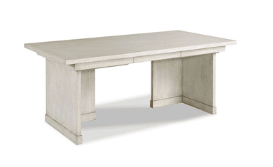 A rectangular conference table with a light off-white or beige finish. The table features a thick, rectangular tabletop supported by a trestle-style base.  The base consists of two large vertical supports connected by a horizontal stretcher, creating a sturdy and visually appealing structure. The tabletop appears to have a subtle wood grain visible under the finish. There is a slight lip or edge detail visible on the tabletop. The table legs are rectangular and have a slightly tapered or squared-off appearance. — 3D model