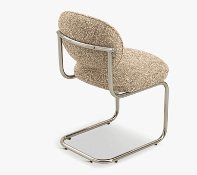 A modern accent chair featuring a cantilever base and upholstered seat and back. The frame is constructed from polished tubular metal, forming a cantilevered structure that supports the seat and backrest. The seat and backrest are generously padded and upholstered in a textured, speckled fabric. — 3D model