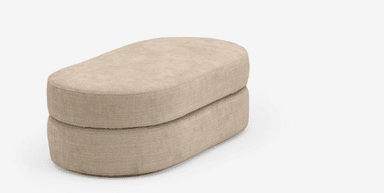 An upholstered two-tier ottoman in a light beige textured fabric, featuring a soft, rounded capsule shape. — 3D model