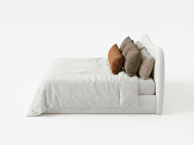 A bed with a curved, upholstered headboard and a light-colored textured comforter. It is adorned with several decorative pillows: a long lumbar pillow in a rust color, and three square pillows in an olive green hue, arranged behind the lumbar pillow. The bed appears to be a queen or king size. — 3D model