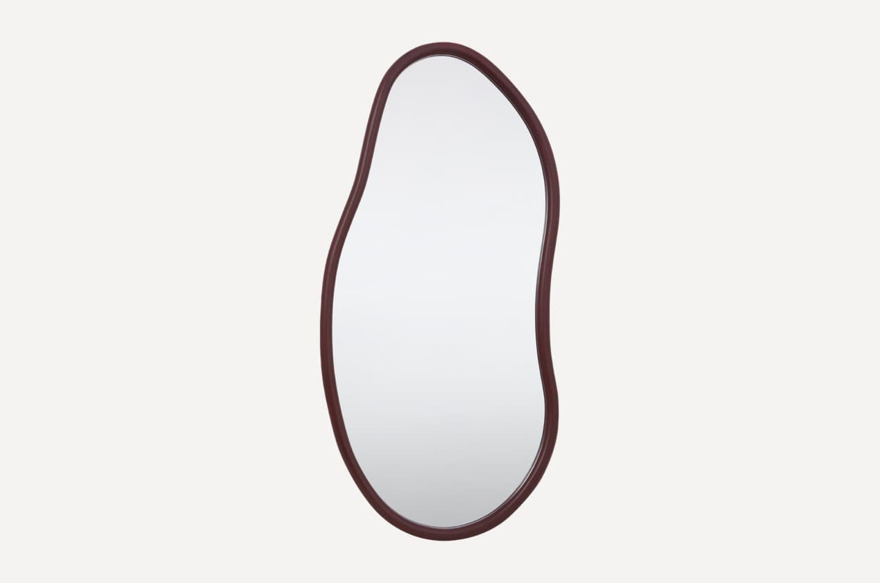 A full-length mirror featuring an irregular, organic silhouette, framed in a dark, possibly wooden, material. The reflective surface is prominently displayed, highlighting the unique freeform shape. — 3D model