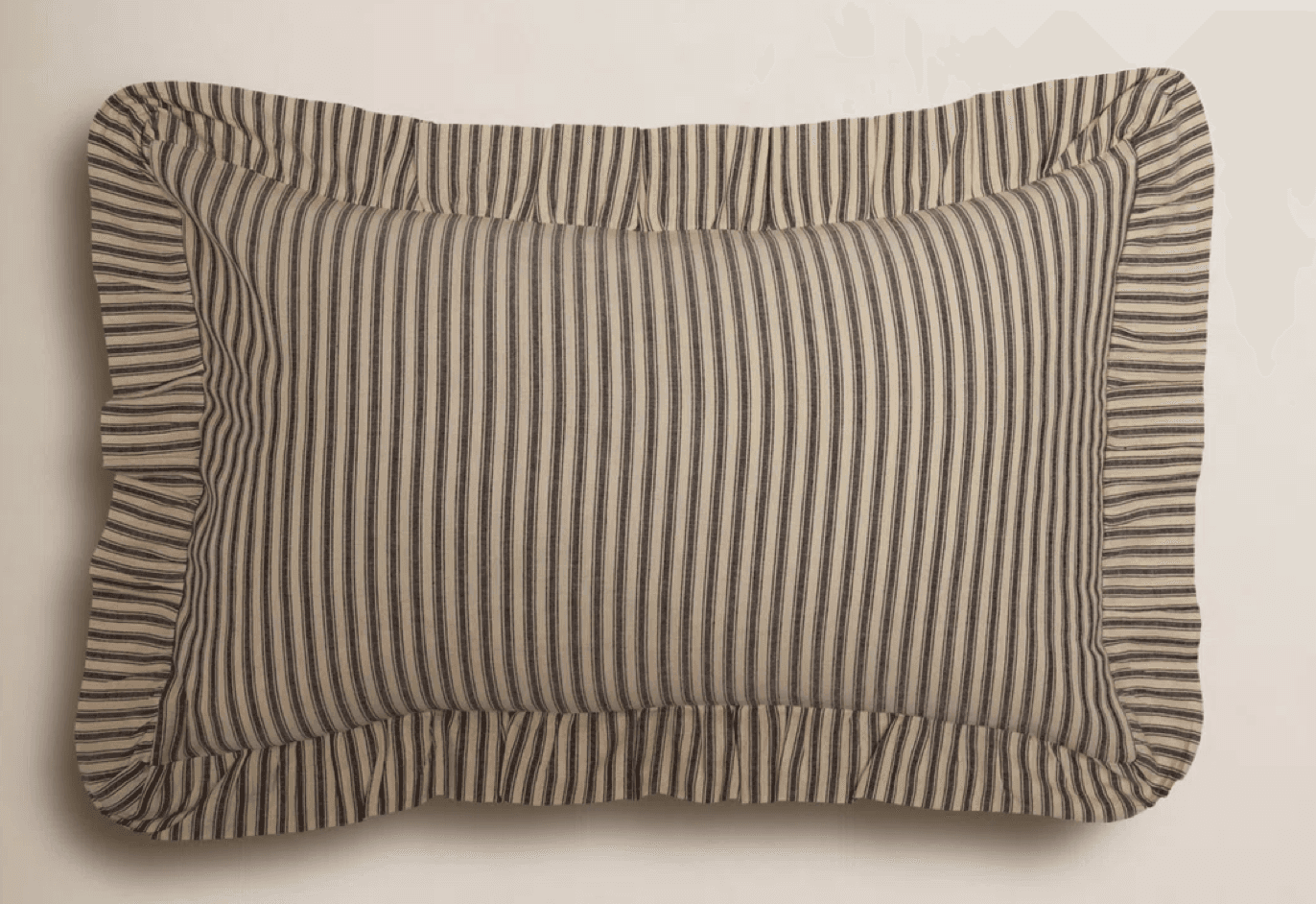 A rectangular pillow with a ticking stripe pattern, featuring a ruffled flange along all edges. The stripes are oriented vertically on the main body of the pillow and horizontally on the flange. — 3D model