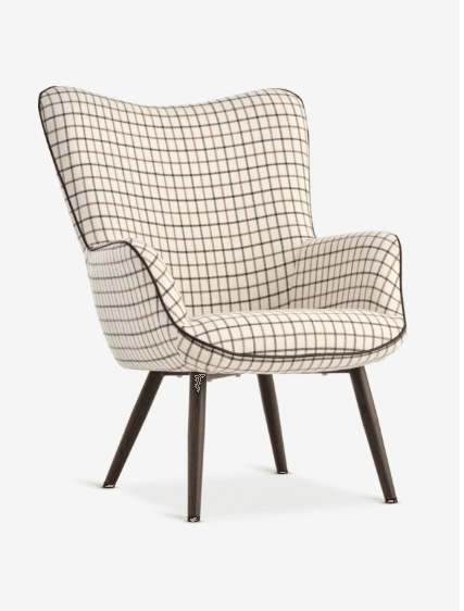 An armchair with a high back and integrated arms, upholstered in a checked fabric. The chair features four tapered wooden legs. — 3D model