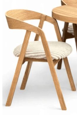 A modern dining armchair crafted from light-toned oak wood, featuring a curved backrest that seamlessly integrates into the armrests. The seat is upholstered with a cream-colored, vertically ribbed fabric cushion, providing a soft contrast to the wooden frame. The chair stands on four straight, slightly tapered wooden legs. — 3D model