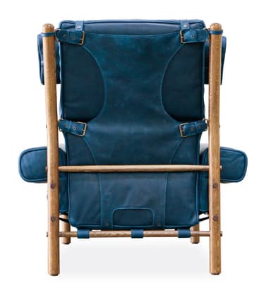 A high-backed armchair with a distinct, padded headrest secured by leather straps. The seat and back cushions are segmented, creating a tufted appearance. The frame is constructed from natural wood posts, with visible metal fasteners and leather strapping supporting the seat. — 3D model
