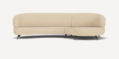 A modern curved sectional sofa, upholstered in a light beige or cream textured fabric, featuring a flowing, organic form and supported by slender, angled dark metal legs. — 3D model
