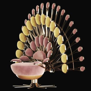 A wireframe model of a decorative armchair designed to resemble a peacock. The base of the chair is a rounded, low-profile seat. Rising from behind and above the seat is a fan-like structure composed of numerous elongated, oval shapes supported by thin, branching supports, mimicking the train of a peacock's tail. The overall design is stylized and artistic, suggesting a novelty or statement piece. — 3D model