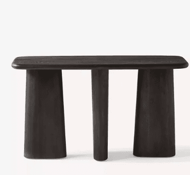 A dark-stained wooden console table featuring a rectangular top with subtly rounded corners. The table stands on three distinct supports: two wider, trapezoidal legs positioned at either end, and a narrower, cylindrical central leg, all tapering slightly towards the top. — 3D model
