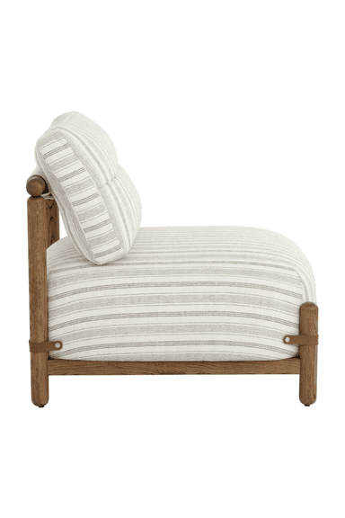 A single armchair with a wooden frame and upholstered seating and backrest. The upholstery features a vertical stripe pattern in white and gray. The frame is constructed from thick, round wooden legs and horizontal supports, with additional leather straps securing the backrest. — 3D model