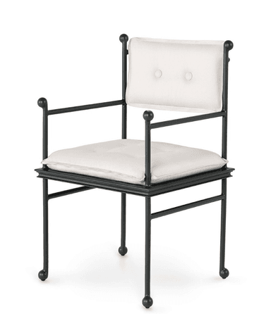 A dark-colored metal frame armchair with light-colored upholstered seat and back cushions. The frame features decorative spherical finials at key connection points and leg bases. — 3D model