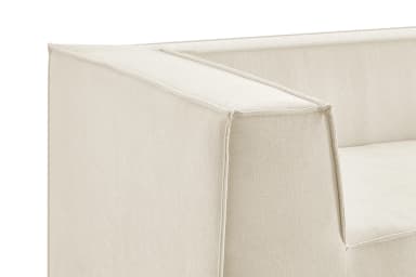 A cream-colored, minimalist sofa with a low profile and straight lines. It features a seamless upholstery that covers the seat, back, and armrests, which are integrated into a solid block form. The armrests have a slight inward slope from top to bottom. The overall design emphasizes a modern and understated aesthetic. — 3D model