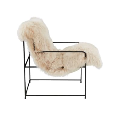 A modern armchair featuring a minimalist black metal frame and plush, cream-colored faux fur upholstery covering the seat, back, and armrests. The frame has a clean, geometric design with slender legs and supports. The fur is long and textured, giving the chair a soft, inviting appearance. — 3D model