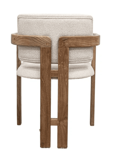 A modern armchair with a wooden frame and upholstered seat and backrest. The frame is constructed from light brown wood with a visible grain pattern. The seat and backrest are upholstered in a textured, light-colored fabric. The armchair features armrests integrated into the wooden frame, and a distinct segmented back cushion. — 3D model