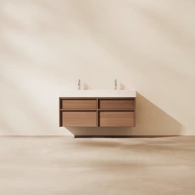 A modern, wall-mounted double sink bathroom vanity featuring a light wood cabinet with four drawers and a seamless white integrated countertop and sinks. Two chrome single-lever faucets are installed. — 3D model