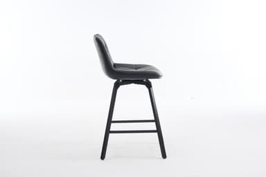 A black bar stool with a geometrically quilted faux leather seat and a black metal splayed-leg base with an integrated footrest. — 3D model