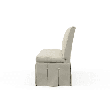 A cream-colored bench with a high back and a skirted base featuring inverted pleats and decorative buttons. The bench has a cushioned seat and backrest, upholstered in a textured fabric. — 3D model