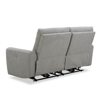 A light grey upholstered two-seater loveseat featuring individual reclining mechanisms. The design is contemporary with clean lines, padded armrests, and visible lumbar support in the back cushions. A control panel for the reclining function is subtly integrated into the side of the armrest. — 3D model