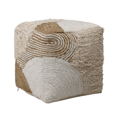 A cylindrical ottoman constructed with a patchwork design of woven jute and thick rope-like material. The patterns vary across the surface, featuring concentric circles and linear arrangements. The color palette is neutral, consisting of off-white and natural jute tones. — 3D model