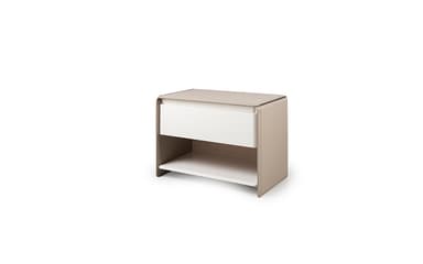 A contemporary nightstand with a single drawer and an open shelf below. The exterior casing and top surface appear to be upholstered in a light brown or beige material, possibly leather or a textured fabric, with visible stitching along the edges. The drawer front is a contrasting white, and the open shelf is also white, creating a two-tone aesthetic. The design features rounded corners and a minimalist silhouette. — 3D model