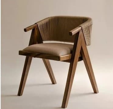 A contemporary armchair featuring a solid wood frame, a curved backrest with tightly woven natural rope, and a padded, upholstered seat cushion. — 3D model