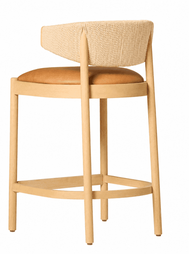 A contemporary counter-height bar stool featuring a light natural wood frame, a tan leather upholstered seat, and a curved backrest with a woven natural fiber infill. It includes a circular footrest for support. — 3D model