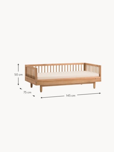 A modern daybed constructed from light-toned wood, featuring slatted sides and ends. It includes a recessed platform for a mattress, which is visible as an off-white cushion. The design is minimalist, with short, tapered legs providing subtle elevation. The overall aesthetic is clean and contemporary. — 3D model