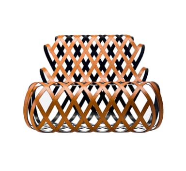 A modern, sculptural chair with an open, interwoven lattice structure. The chair's form is characterized by continuous, curved bands that create a dynamic, cage-like appearance, providing both support and visual lightness. The overall shape suggests a lounge or accent chair. — 3D model