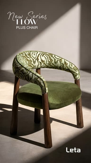 A contemporary armchair featuring a curved, integrated backrest and armrests upholstered in a patterned green fabric, complemented by a solid green velvet seat. It stands on four dark, tapered wooden legs. — 3D model