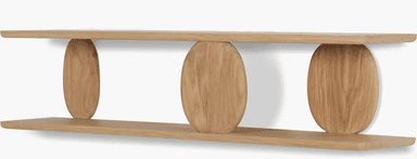 A contemporary two-tiered shelf unit constructed from wood. The unit features a simple, horizontal shelf design, with each shelf supported by distinctive, rounded, disc-like wooden elements. These supports are positioned centrally beneath the shelves, creating a visually unique and minimalist aesthetic. The natural wood grain is visible, suggesting a focus on material authenticity. The upper shelf displays a white cylindrical vase containing artificial succulents, and a stack of two books rests on the lower shelf. — 3D model