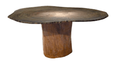 A robust dining table featuring a large, irregularly shaped live-edge wood slab as its top, displaying prominent wood grain and growth rings. It is supported by a thick, cylindrical wood pedestal base, showcasing a natural, rustic aesthetic. — 3D model