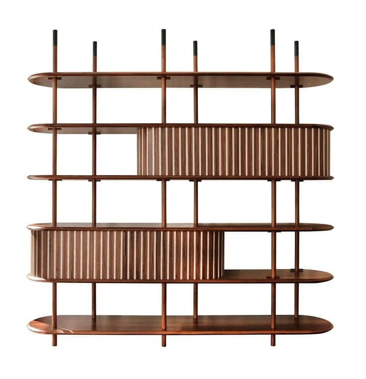 A contemporary freestanding bookshelf crafted from dark-toned wood, featuring multiple rounded-edge shelves supported by vertical posts. Two sections incorporate integrated, oval-shaped cabinets with vertical slat fronts, providing concealed storage within the open shelving structure. The top of some vertical posts features a darker, contrasting cap. — 3D model