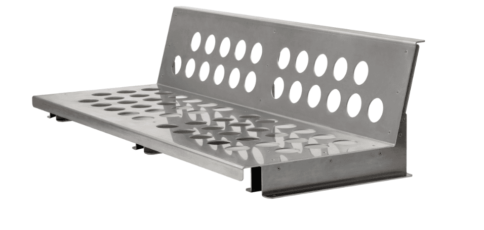 A metallic bench with a perforated seat and backrest. The seat has multiple circular perforations arranged in a grid pattern. The backrest is angled and also features two rows of larger circular perforations. The bench appears to be constructed from a single sheet of metal, folded and riveted to form its structure. It has a utilitarian and industrial aesthetic. — 3D model