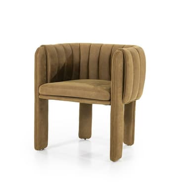 A modern armchair with a rounded back and seat, upholstered in a textured fabric. The backrest features vertical channel tufting, creating a series of indentations. The chair has four block-like legs, also upholstered in the same fabric, positioned at the corners of the seat. — 3D model