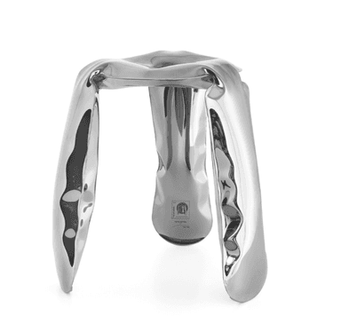 A stool with a unique, abstract design. It features a highly polished, metallic surface that reflects light intensely. The form is organic and fluid, with three apparent legs that are wide and bulbous at the top, tapering towards the ground. The seat area is a smooth, concave surface, also highly reflective. The overall aesthetic suggests a modern, avant-garde piece. — 3D model