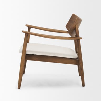 A classic Mid-Century Modern armchair featuring a gracefully curved wooden backrest and integrated armrests. The frame is constructed from a medium brown wood, possibly teak or walnut, with tapered legs. The seat is a removable cushion upholstered in a light, off-white fabric. — 3D model