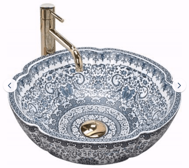 A decorative round ceramic vessel sink featuring an intricate blue and white chinoiserie pattern and a scalloped rim, paired with a tall, matte brass single-handle faucet. — 3D model