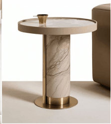 A modern round side table featuring a marble top, a substantial cylindrical marble pedestal base, and distinctive brass accents. The tabletop has a raised edge, and the base incorporates a vertical brass strip and a circular brass plinth. — 3D model