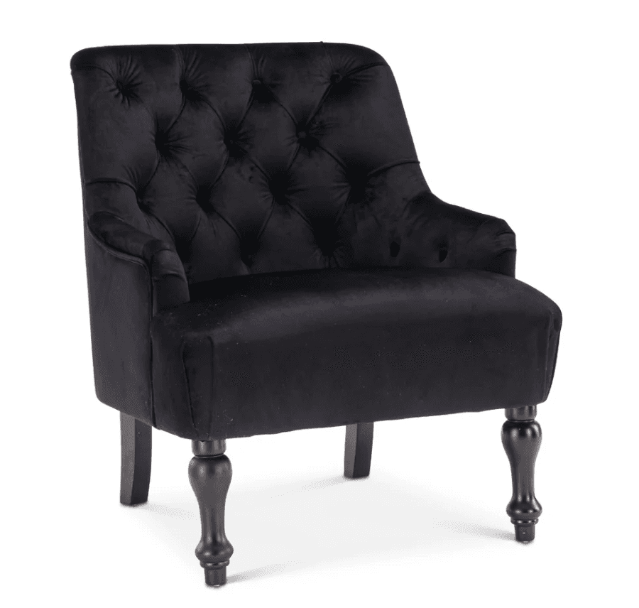 A black velvet tufted armchair featuring rolled arms and turned wooden legs, presented against a white background. The chair's backrest is deeply button-tufted, providing a classic, elegant appearance. The upholstery is a soft, plush velvet material, and the front legs are decoratively turned, contrasting with the simpler, straight rear legs. — 3D model