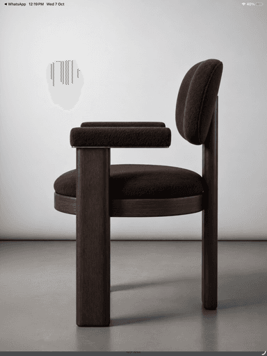 A contemporary dark wood armchair featuring a robust frame and plush, rounded upholstered components. The chair has a dark brown textured fabric on its seat, backrest, and rounded armrests. The sturdy wooden legs and back support are also dark-stained, creating a cohesive, modern aesthetic. — 3D model