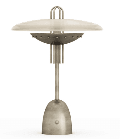 An Art Deco or Streamline Moderne inspired table lamp featuring a distinctive tiered, layered shade made of translucent material, supported by a brushed metal base and stem. The lamp incorporates a bowl-shaped element beneath the shade adorned with small rivet-like details. The base is a smooth, rounded dome, and the overall finish is a matte, aged silver tone. — 3D model