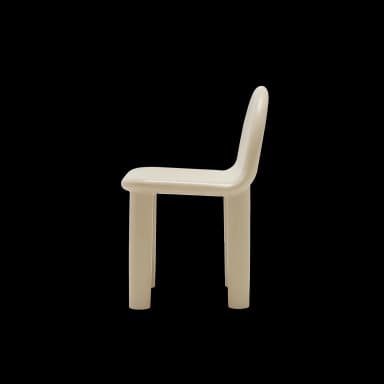 A minimalist, monolithic stool or small side table with a rounded, semicircular top and four integrated cylindrical legs, crafted from a light beige molded material. — 3D model