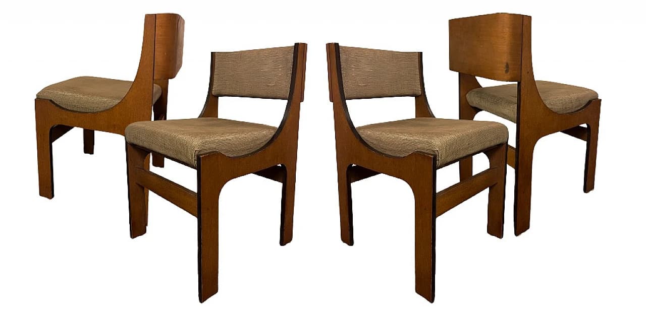 A wooden chair with a upholstered seat and back. The frame is constructed from dark wood with a smooth finish. The seat and back are covered in a textured, light brown fabric. — 3D model