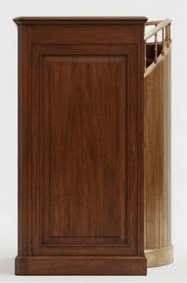 An exquisite Art Deco style bar cabinet featuring a distinctive curved form and rotating functionality. It is constructed from dark wood, likely walnut, with a rectangular top surface and interior trays adorned with a finely crafted herringbone veneer pattern. The curved exterior edge is elegantly finished with a polished brass rail. The cabinet's unique design incorporates multiple fan-shaped, segmented trays that appear to slide or rotate outwards, offering organized storage for bar essentials. — 3D model